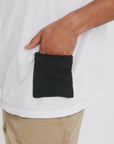 White iron-on pocket accessory on cotton tee_adaptive clothing add-on_The Shapes United
