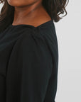 Black boat neck top sleeve detail_neat finish everyday comfort