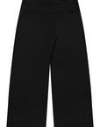 The Shapes United adaptive dress pants in black side-fastening, flat seams.