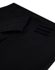 Close-up of black adaptive dress pants_soft side opening with Velcro